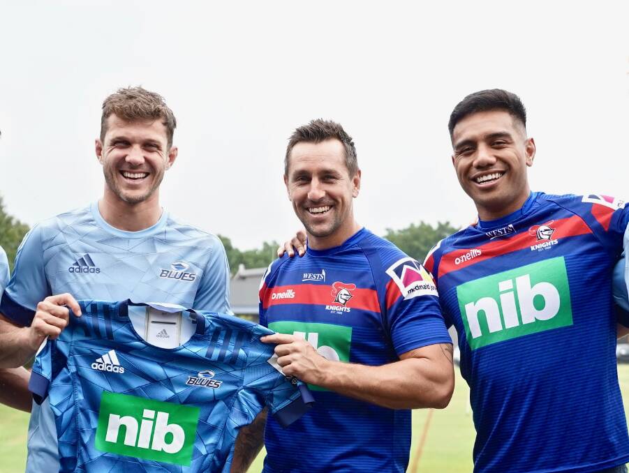 Auckland Blues back Matt Duffie catches up with Mitchell Pearce and Hymel Hunt yesterday.