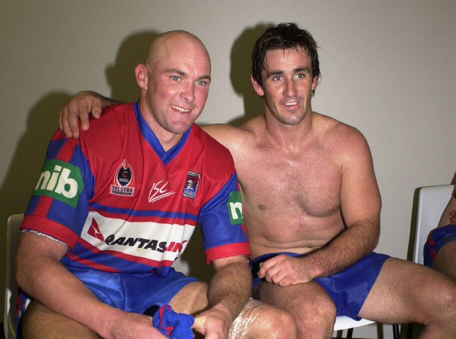 Outstanding: Two club greats Ben Kennedy and Andrew Johns celebrate another Knights victory. The pair were instrumental in the 2001 grand final triumph over Parramatta. Photo: Steve Holland.
