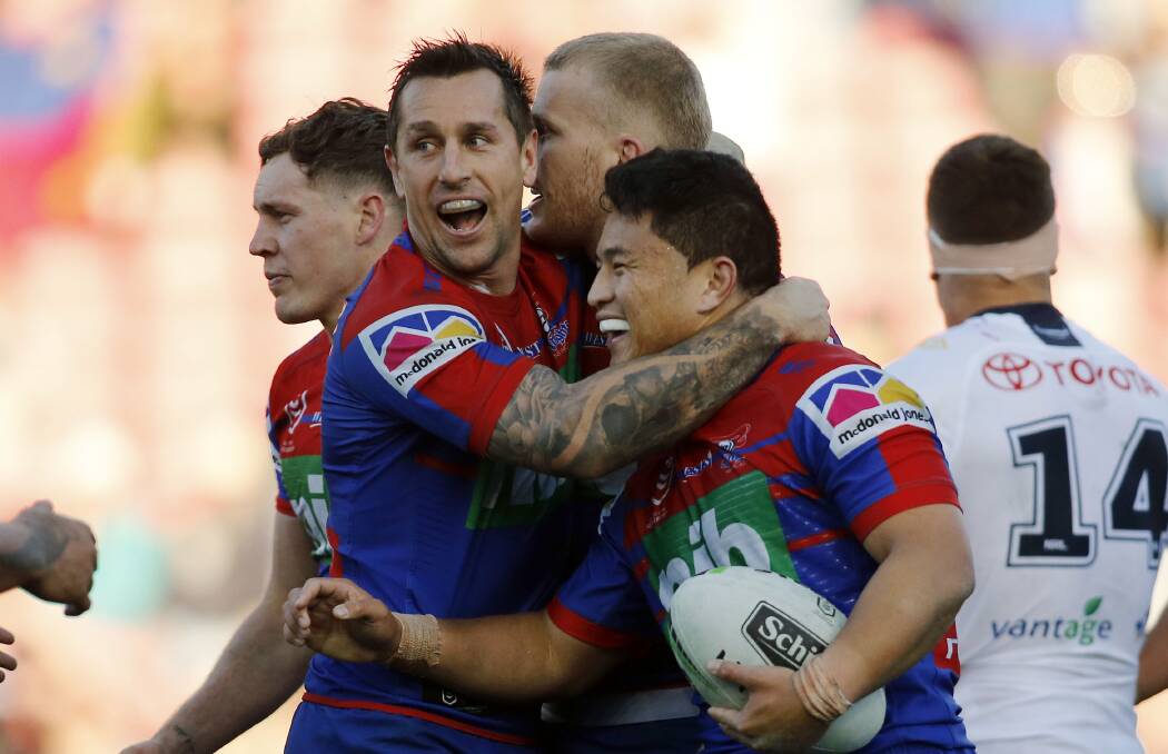 In favour: Playmaker Mason Lino is congratulated by skipper Mitchell Pearce after scoring a try against the North Queensland Cowboys last season. The pair will team up again on Saturday against the Warriors in Tamworth for the first time in 2020 under coach Adam O'Brien following the season-ending injury to Blake Green last weekend. 