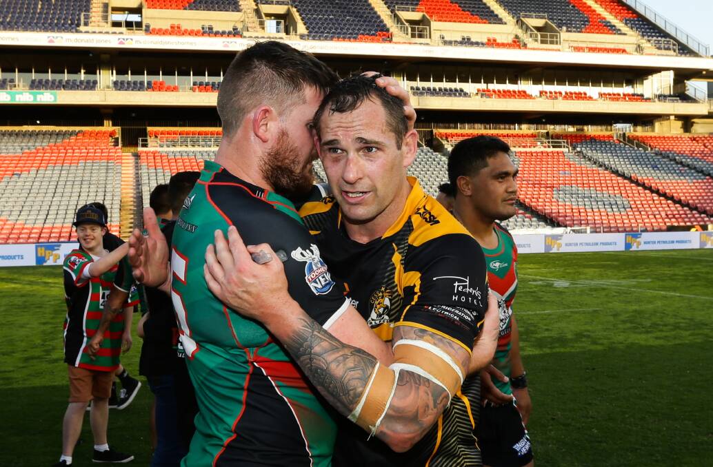 Al Lantry and Brendan Hlad embrace after the 2019 Newcastle RL grandfinal