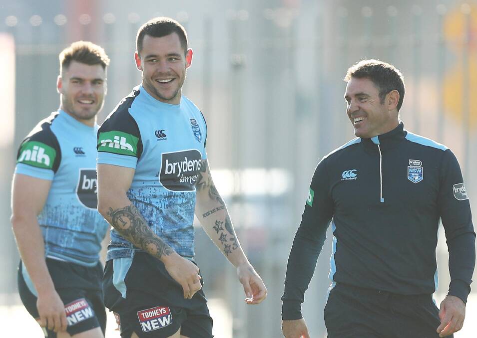 All smiles: Knights prop David Klemmer and Sydney Roosters backrower Angus Crichton enjoy a laugh with NSW coach Brad Fittler in Origin camp. Picture: Getty Images.