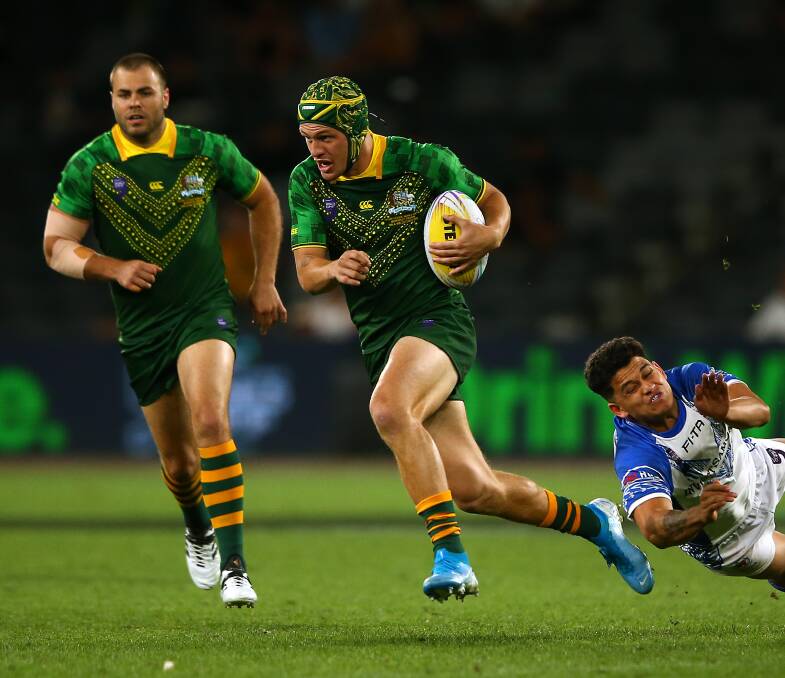 Try-time: Knights star Kalyn Ponga on his way to scoring the opening try against Samoa in the semifinals of the World Nines. Picture: Getty Images.