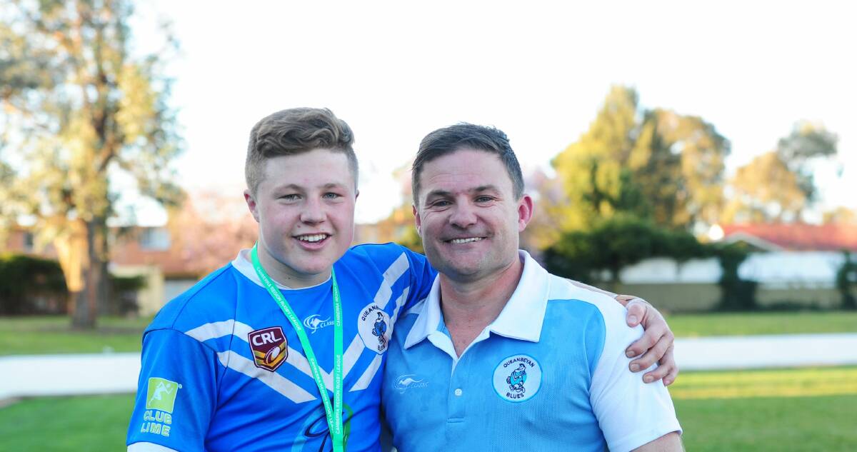 Zac Woolford pictured with his father Simon in 2014.