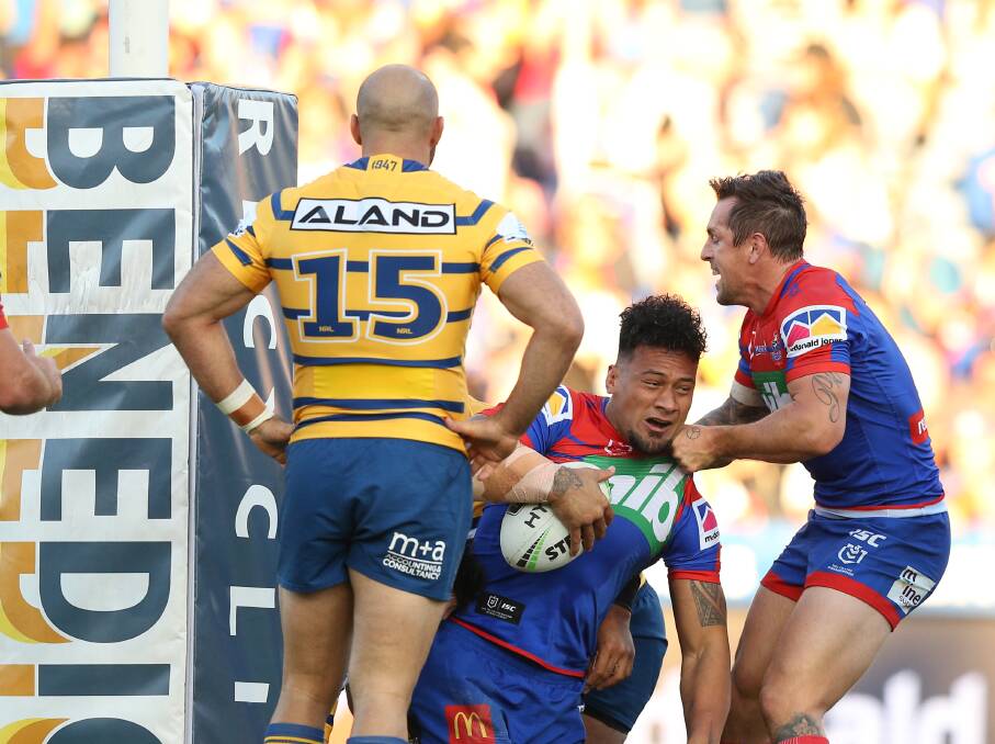 Leader: Knights skipper Mitchell Pearce is the first to congratulate his prop James Gavet following his first half try.