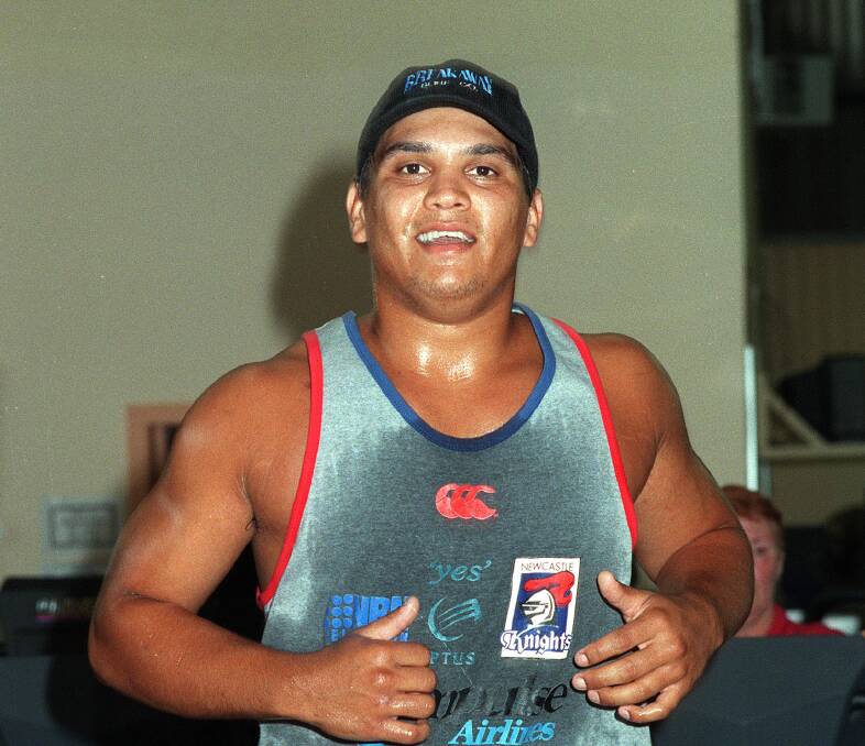 Happy: A youthful Owen Craigie sweating up a storm during a gym session for the Knights in 1997 prior to the club's grandfinal triumph over Manly. Picture: Stefan Moore.
