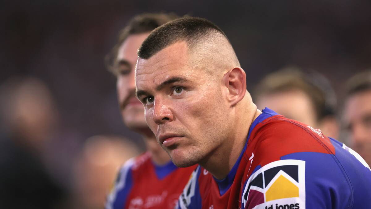 David Klemmer watches the Roosters' domination from the bench on Saturday night.