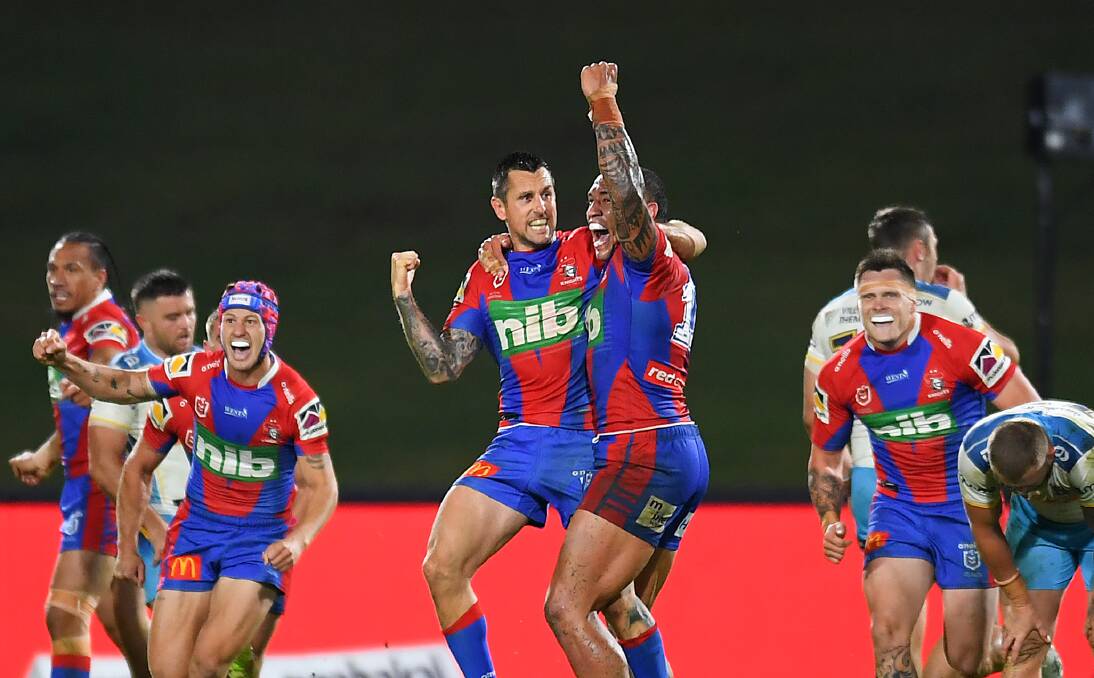 Knights players react to Mitchell Pearce's field goal.