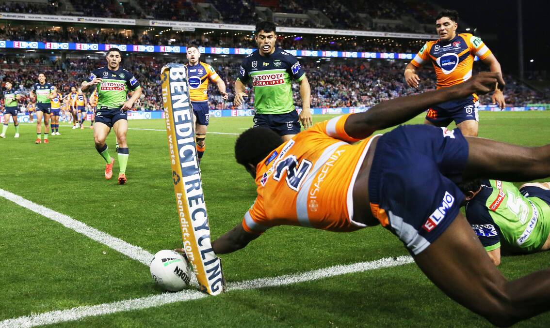 Close call: Edrick Lee narrowly denied a try.. Picture: Peter Lorimer