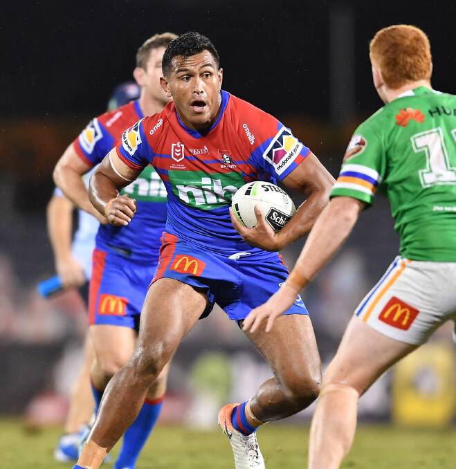 On the charge: Knights prop Daniel Saifiti takes on the Raiders defence at Campbelltown Stadium. Saifiti and the rest of the Knights pack finished with a clear points win over their rivals.Picture: NRL Photos.