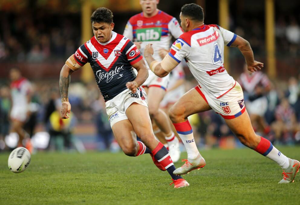 Game to forget: Sydney Roosters centre Latrell Mitchell about to pounce on the ball and run 90 metres to score after trapping a poorly executed Jesse Ramien grubber kick just after halftime in Saturday's 48-10 demolition at the SCG. Pictures: Darren Pateman/AAP. 