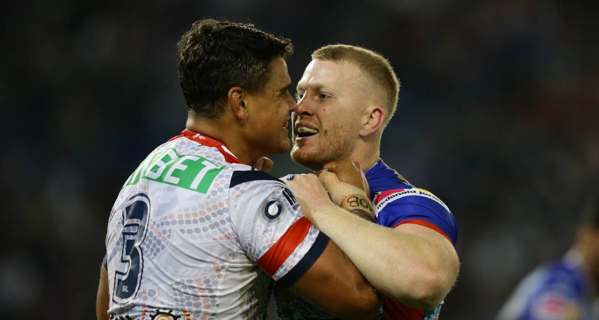 Latrell Mitchell and Mitch Barnett get up close and personal