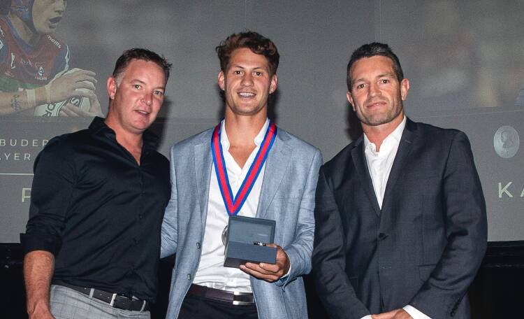 Kalyn Ponga with coach Adam O'Brien and footy GM Danny Buderus after winning the Danny Buderus Medal on Thursday night.