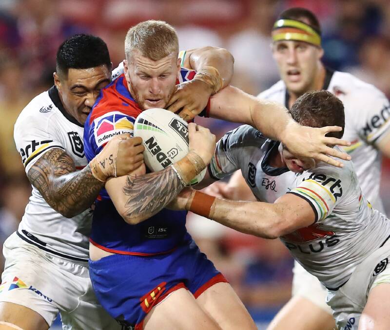 Real positive: His team may have suffered a defeat but Knights interchange forward Mitch Barnett could not have done any more to inspire his side, scoring a late try and playing strongly. Picture: AAP. 