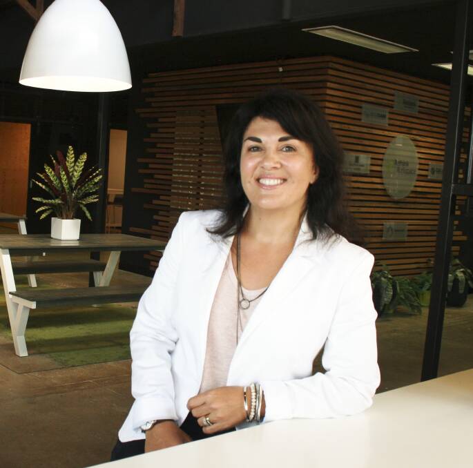Rethinking business: Cassandra Kavanagh in her Newcastle office. 