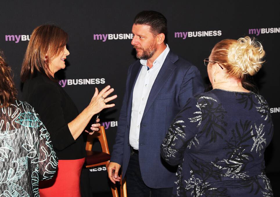 Manu Feildel chats to Hunter businesses in Newcastle. Picture: Peter Lorimer
