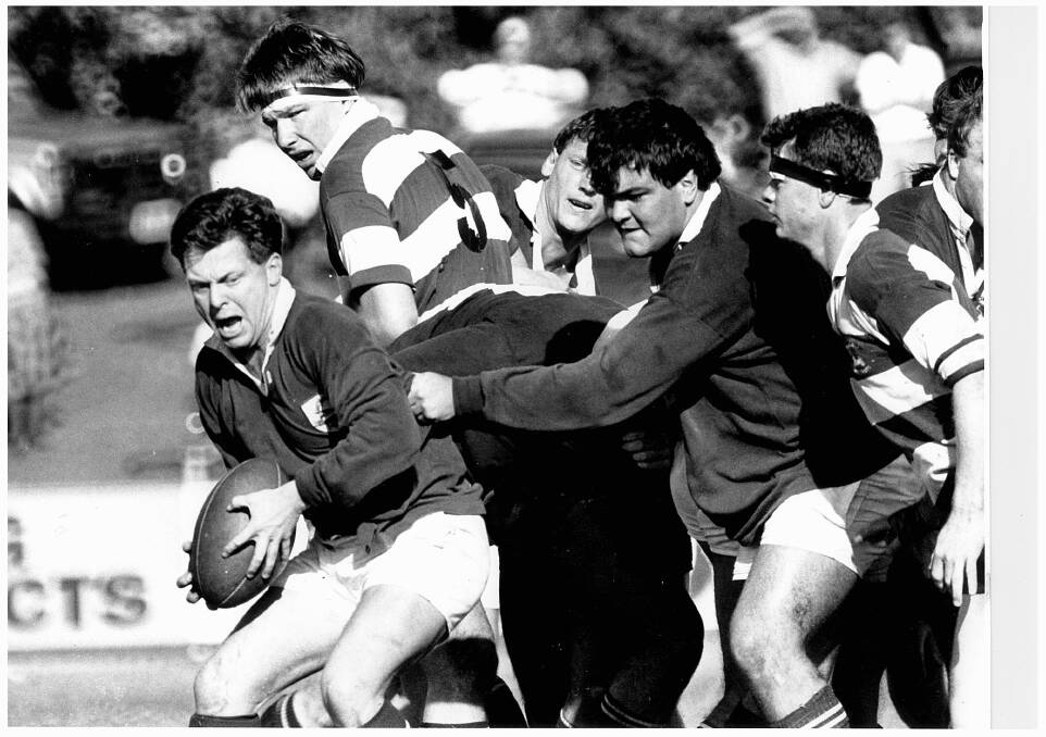 'He bled green': David Chapman, with the ball, playing for Merewether Carlton in 1989.