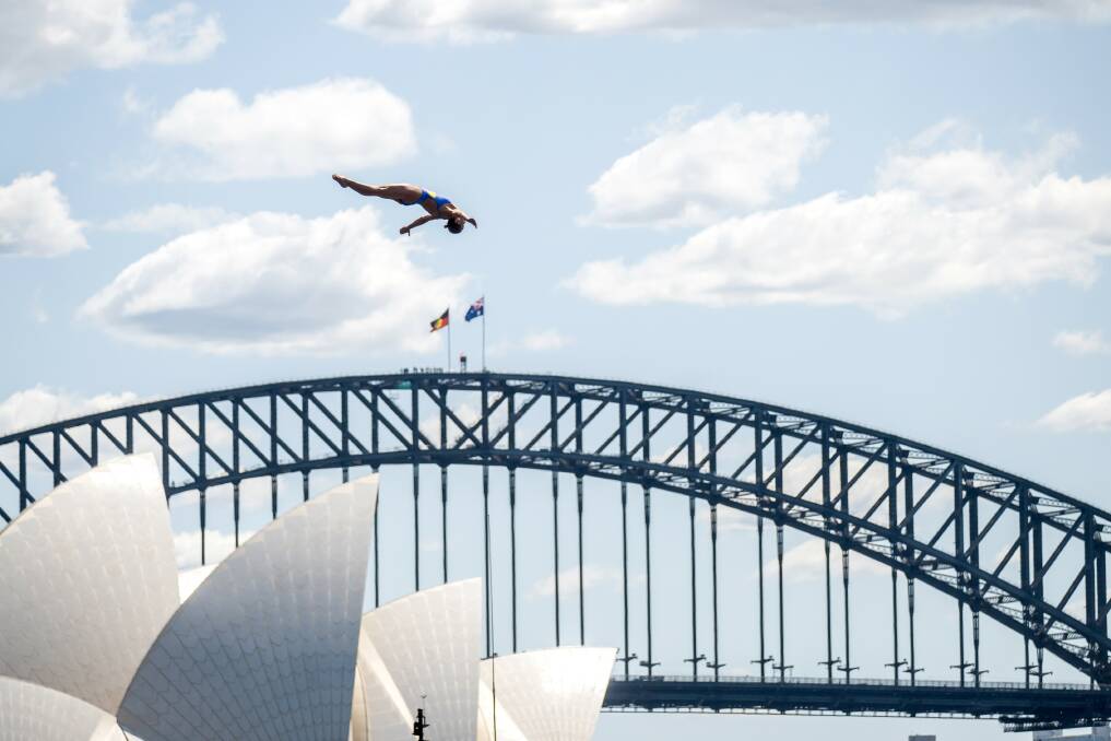  Rhiannan Iffland, soaring over Sydney, says its "special to compete professionally at something I love." Picture supplied by Red Bull Content Pool 