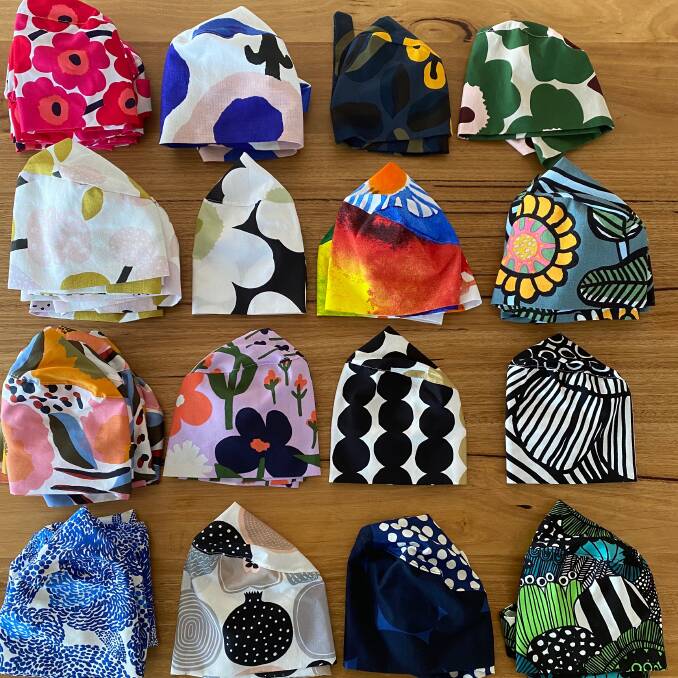 Adding colour: Some of the scrub hats Libby Helinski made from Marimekko fabric. Picture: Supplied