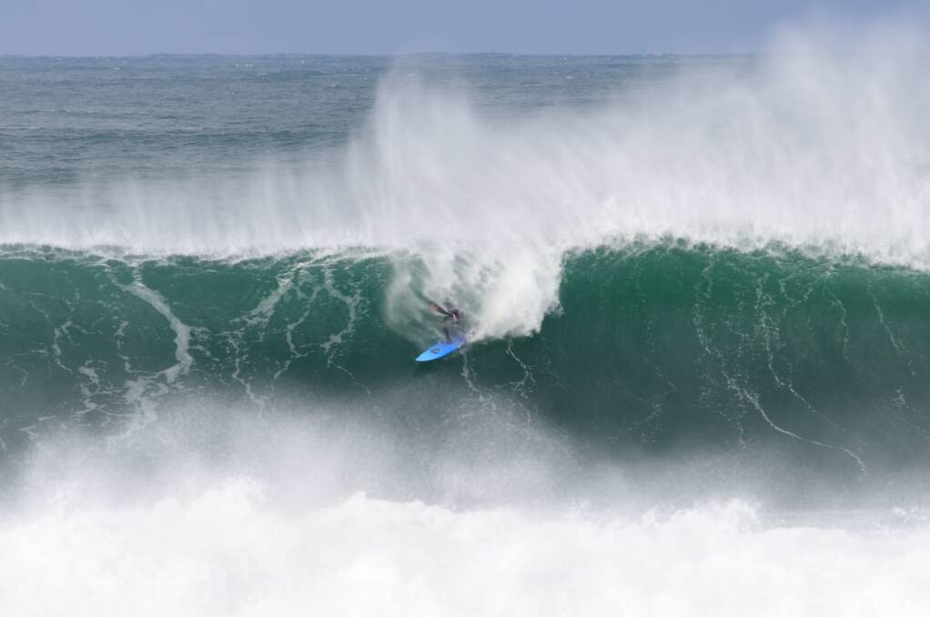Like wow: Tim Dickson on May 23 during the big well at Merewether, captured by photographer Richard Sutter. 