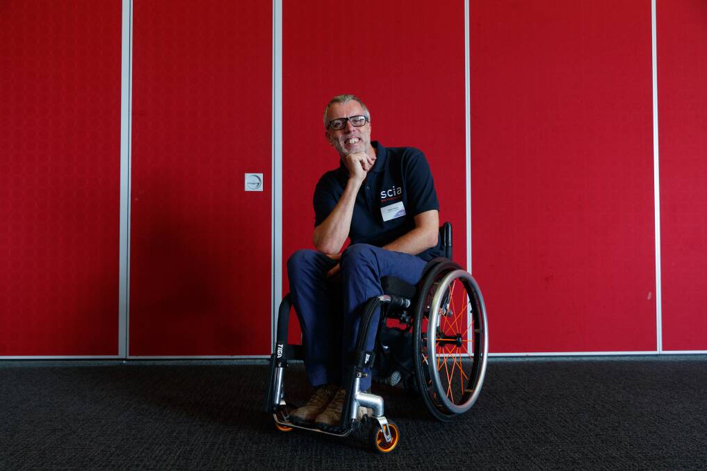 Spinal Cord Injuries Australia employee Rob Wynn says his spinal injury changed his outlook for the better. SCIA has received funding from Newcastle Permanent Charitable Foundation. Picture by Max Mason-Hubers