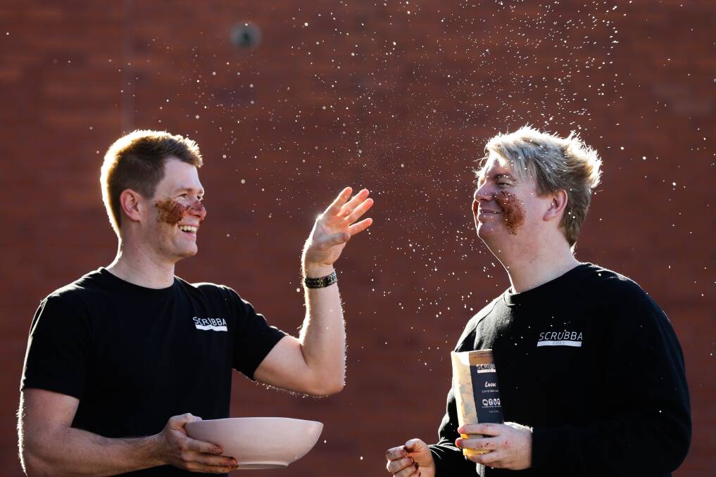 Moore and Lawlor mucking around with a cacao and coffee body scrub at the Aroma Festival in Maitland in 2021. 