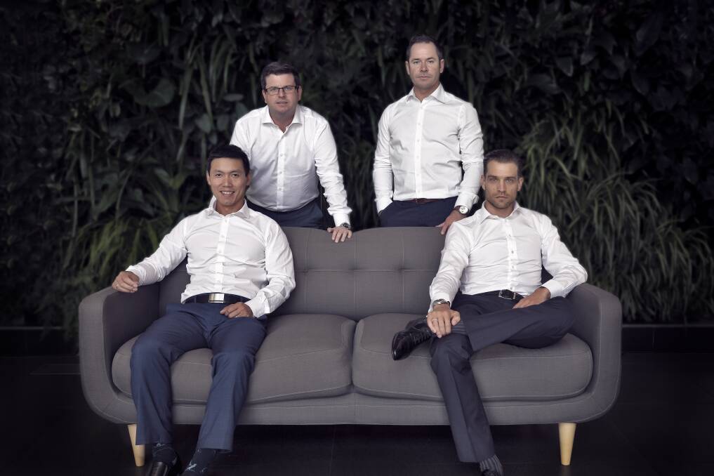 Supporting the "Newcastle of tomorrow": Commercial Collective general manager Dane Crawford, far right, with colleagues, from left, Byrne Tran, Matt Kearney and Adam Leacy. Picture: Supplied 