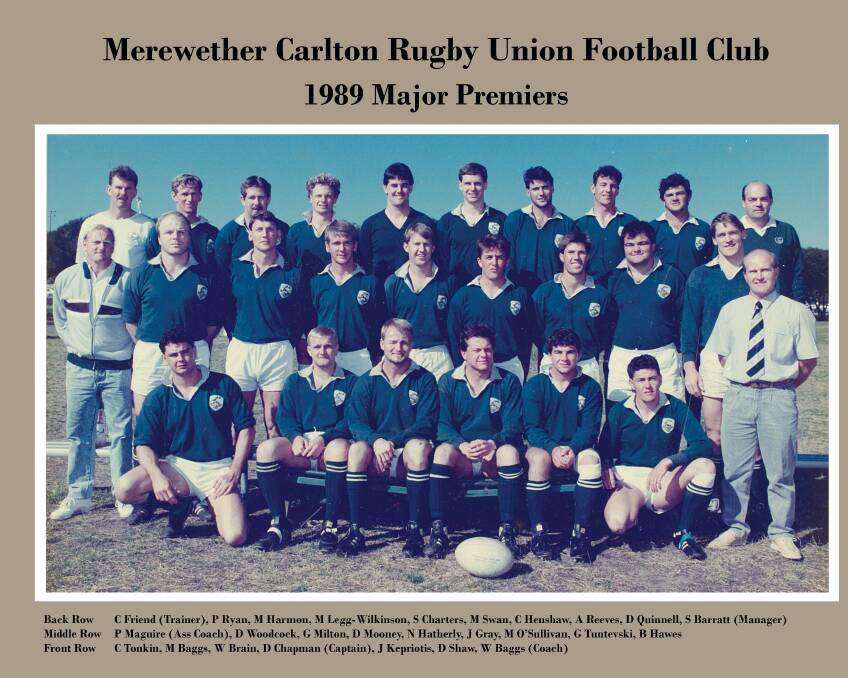 Green glory: David Chapman, sitting with the ball at his feet, after the 1989 premiership win with Merewether Carlton. Picture: Supplied