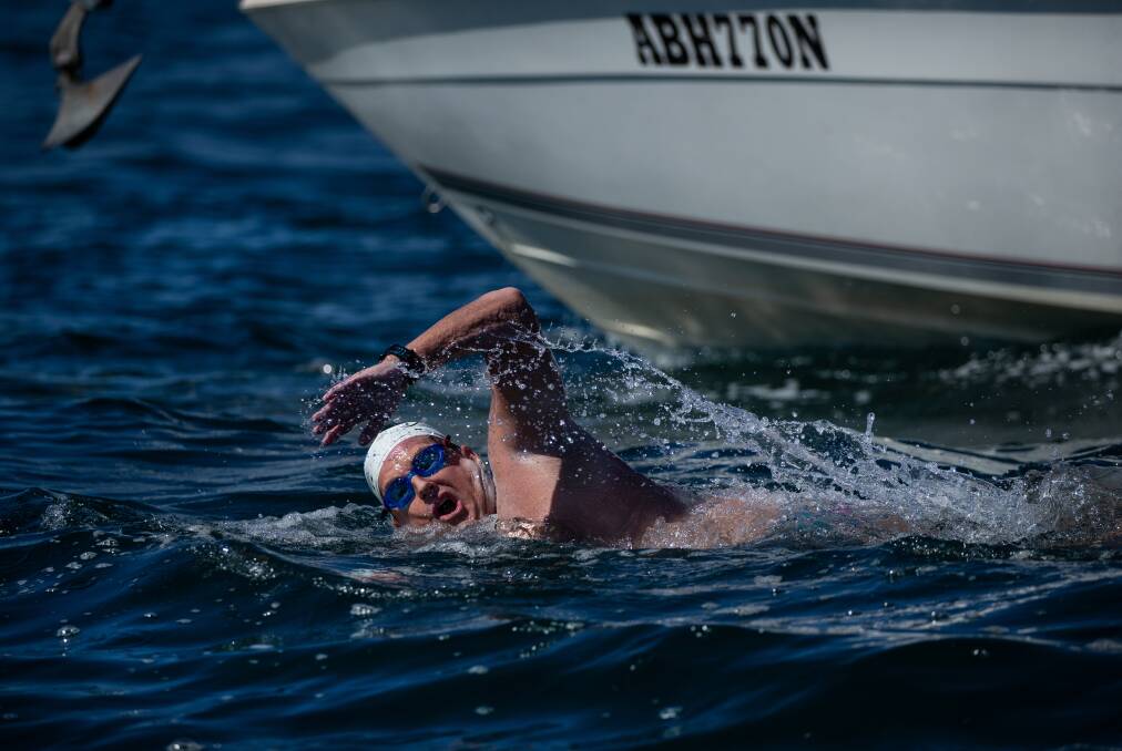 Keep on swimming: Craig Clarke nears the halfway point at Redhead during his 2020 swim. Picture: Marina Neil 