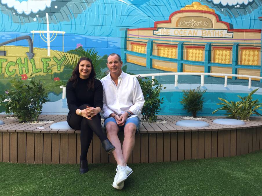 Goals: Go Kindy general manager Chris Passfield with his daughter Meg at the Newcastle West centre. Picture: Penelope Green 