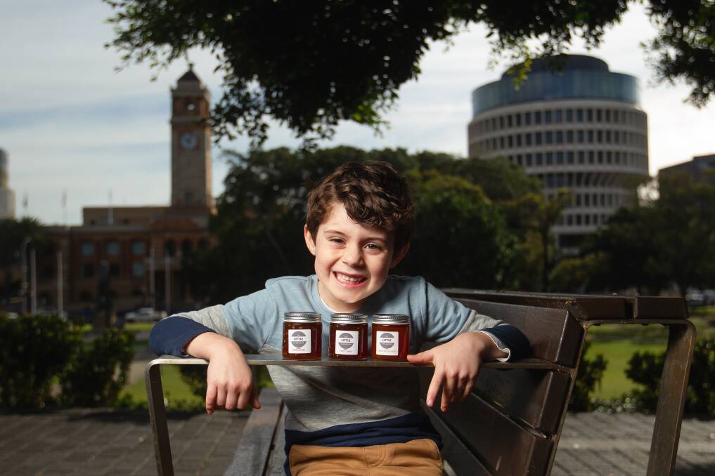 Seed of an idea: Tobias Thornton in Civic Park, Newcastle, with some products he sells via The Little Entrepreneur. Picture: Marina Neil 
