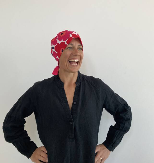 Libby Helinksi in one of the scrub hats she made by hand. Picture: Supplied