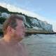 Weather watching: Craig Clarke near the white cliffs of Dover looking across the English Channel. He hopes to swim to Calais as early as July 4. Picture: Supplied