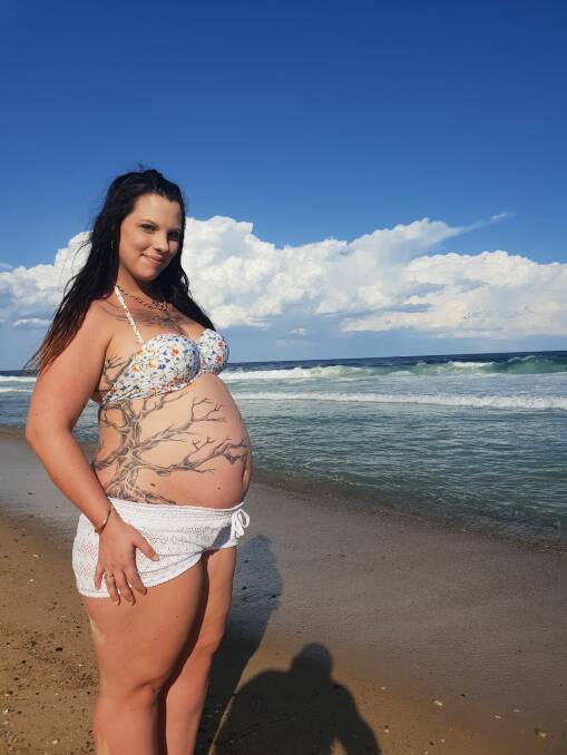 TATTOO BUMP: Alisha Dawson, of Toronto, proudly shows off her tattoo and baby bump. The book will be launched in Belmont on April 1. Picture: Supplied