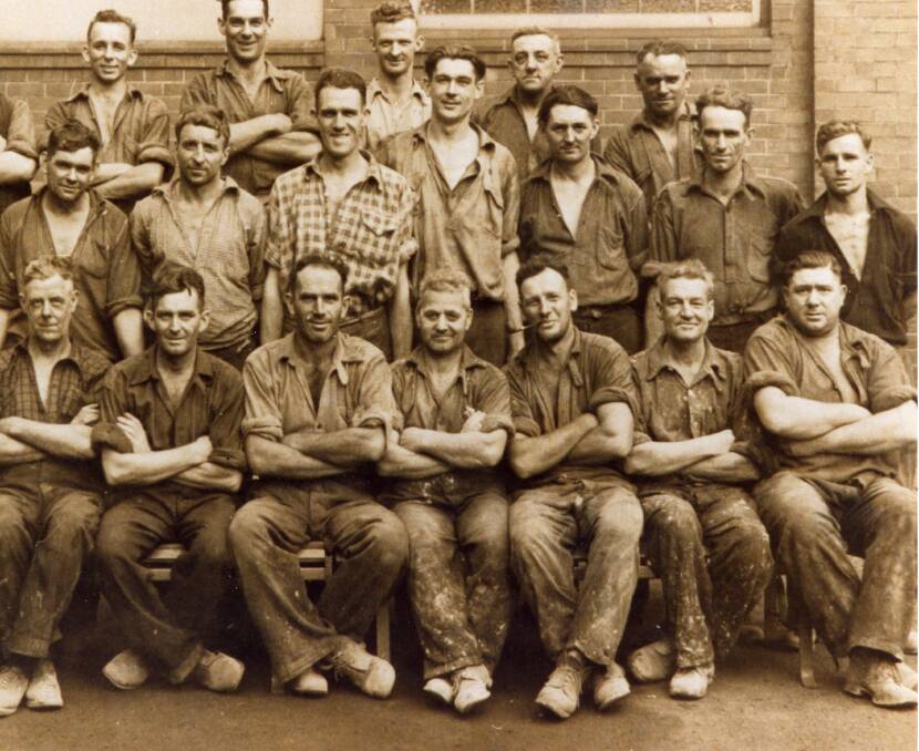 NATION'S STORY: Reader Roland Bannister shares this image of BHP Open Hearth workers in 1942. His father, John ('Jack') Bannister, is centre row, second from right. 