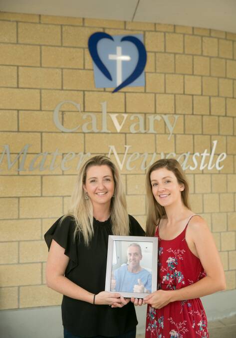 GRATITUDE: Megan Baird and Lisa Eaton outside Calvary Mater Hospital, where their late father Peter Cameron was treated for cancer. Picture: MARINA NEIL