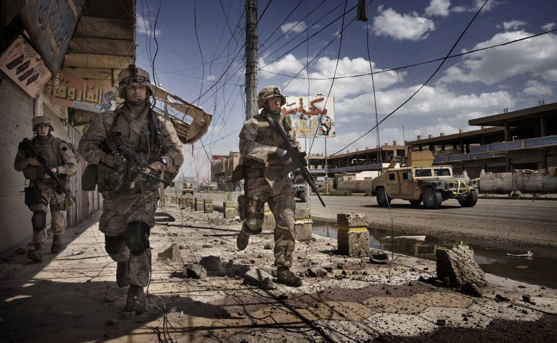ON GROUND: US troops in Iraq after the American-led invasion of 2005. The decision has been linked to further unrest and an ongoing humanitarian crisis across the region.