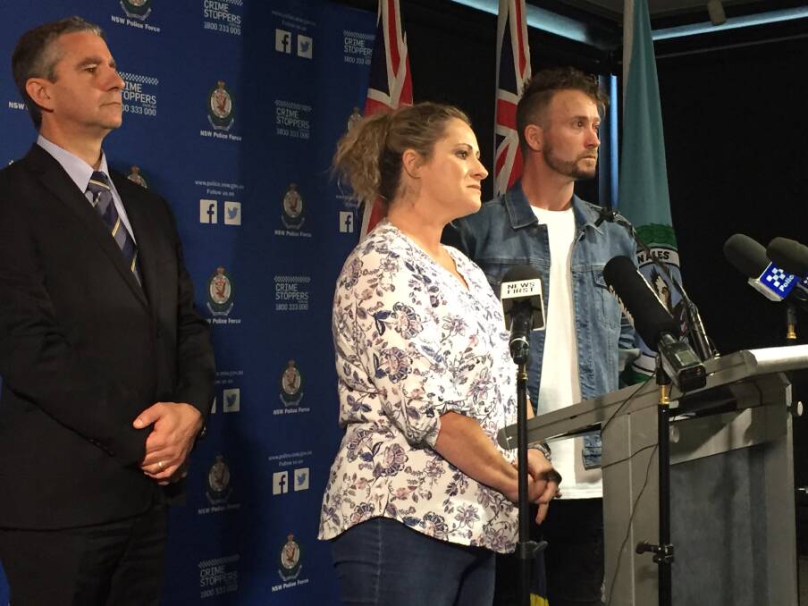 REWARD: Superintendent Scott Cook, Janine Vaughan's sister Kylie and brother Adam announcing the $1 million reward earlier this year.