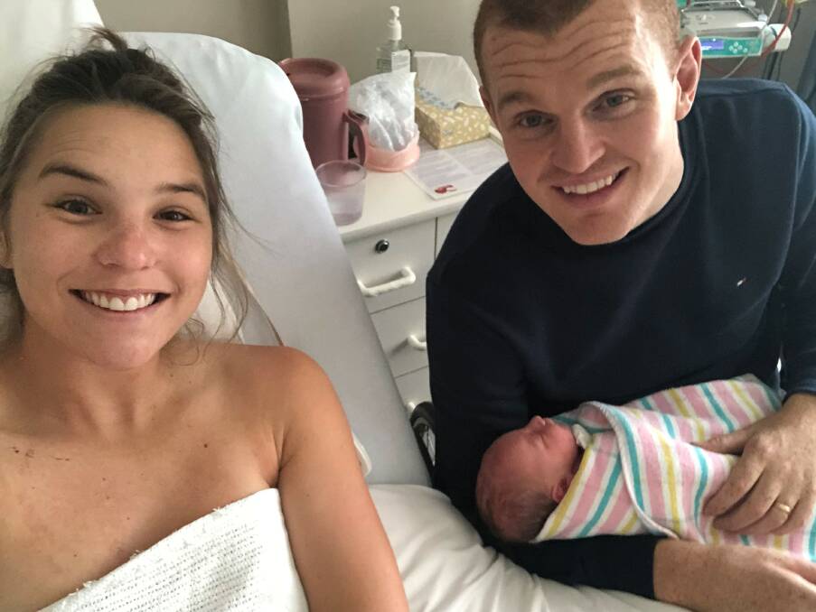 ADDITION: Teigan and Alex McKinnon with baby Harriet, who arrived on Sunday. “It’s easily one of the biggest and best days of my life,” Alex said. 