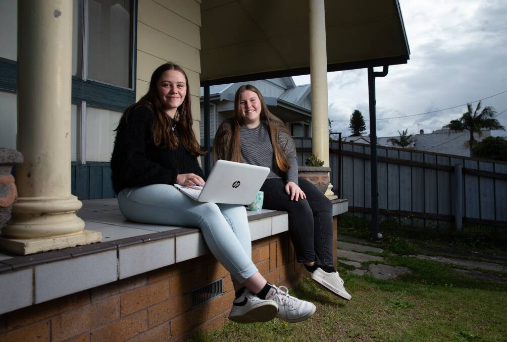 Catching up: Jasmine Read (left) said she missed her mates, including Avi Linsley (right), and welcomed the friends bubble. Students will start to make a staggered return to classrooms from October 25. Picture: Simone De Peak