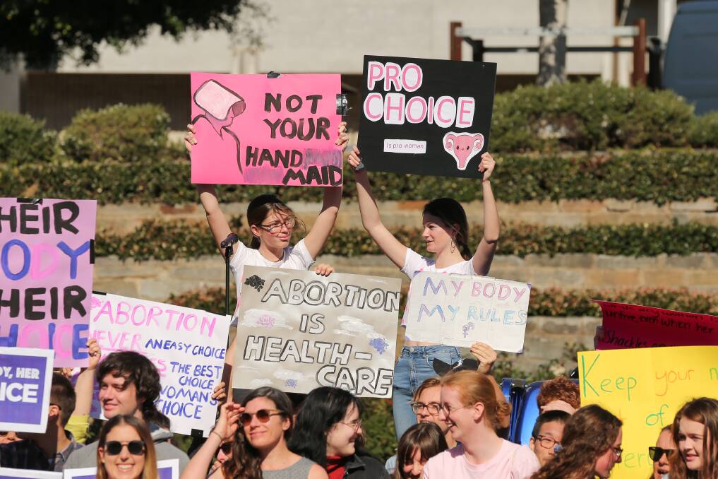 Stand up: Students Aleeyah Clifford and Ruby Hackett organised a rally on July 21. Jenny Aitchison said the government needed to listen to young women, who would be most affected by the bill. Picture: Max Mason-Hubers 