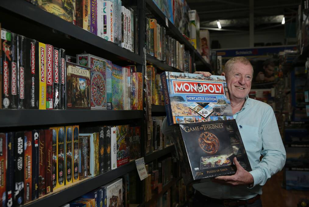 Variety: Colin Scott has kept Frontline Hobbies' Broadmeadow store open during the pandemic and is observing social distancing. Picture: Simone De Peak