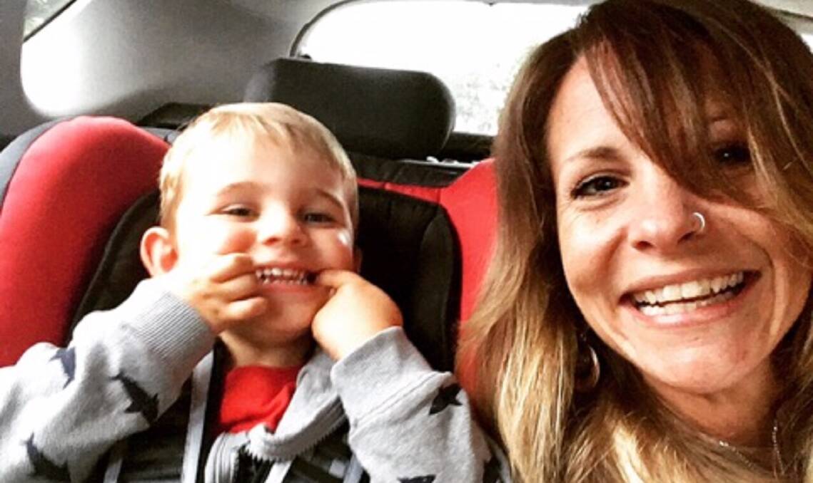 Looking ahead: Tara South, pictured with her friend's son Seth, said she "fell in love with the wrong person". "I had never been in an abusive relationship before and I never will be again." For help: 1800 RESPECT