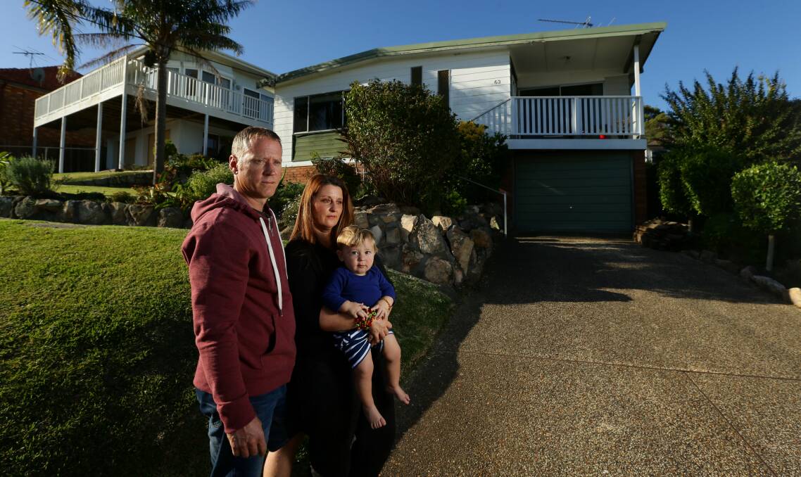 Uncertain future: Jade McCaig and Mark Faithfull with son Finn are considering selling their home and moving into the enrolment zone. They don't want to uproot their daughter Niamh; send their two children to different schools; or re-enrol at a different school that is further away and has composite classes. Picture: Jonathan Carroll