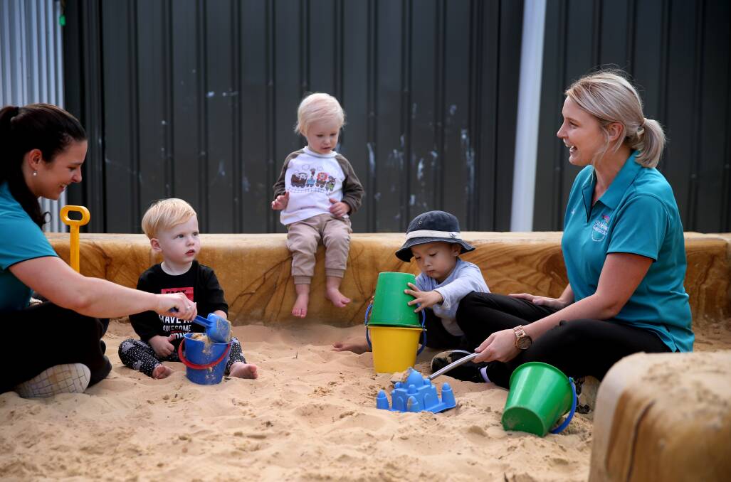 Fun: St Nicholas Early Education teachers Karen Mepham and Kate Berry with Hugo Gray 19 months, Jackson Adams 23 months, Harrison Cooper 3. Picture: Marina Neil
