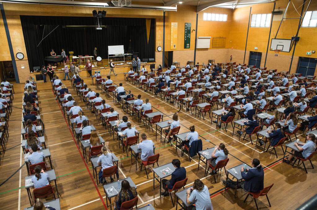It adds up: Hunter parents of students at Catholic schools are calling on the Diocese of Maitland-Newcastle to reduce fees in the face of the COVID-19 pandemic. Picture: Marina Neil