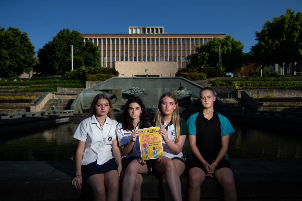 Joining forces: Imogen de Vries from Merewether High, Luka McCallum from Hunter School of the Performing Arts, Emily Ashton from St Philip's Christian College and Abigail Goodsir from HSPA. Abigail said students felt "frustrated and angry" about inaction. Picture: Marina Neil