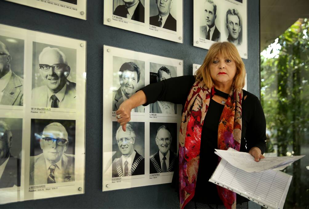 Disgusted: Michelle Shetab said she "just wanted the pictures gone" of Douglas Carley and Milton Orkopoulos. "This is a wall of shame, not a wall of honour.” She will table her petition at a council meeting. Picture: Marina Neil
