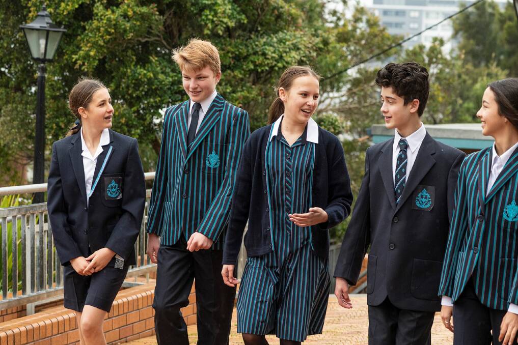 Modern: Newcastle Grammar School students wearing items from the updated range, which adds aqua and stripes and gives girls the choice of wearing shorts or trousers to provide them with extra freedom.
