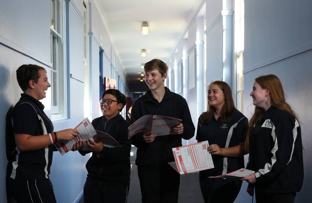 Mark my words: Callaghan College Waratah students April Rodgers, Minh Pham, Mitchell Moore, Matilda Newton and Lucy Williams, who said she expected numeracy to be "pretty easy" compared to reading. Picture: Simone De Peak