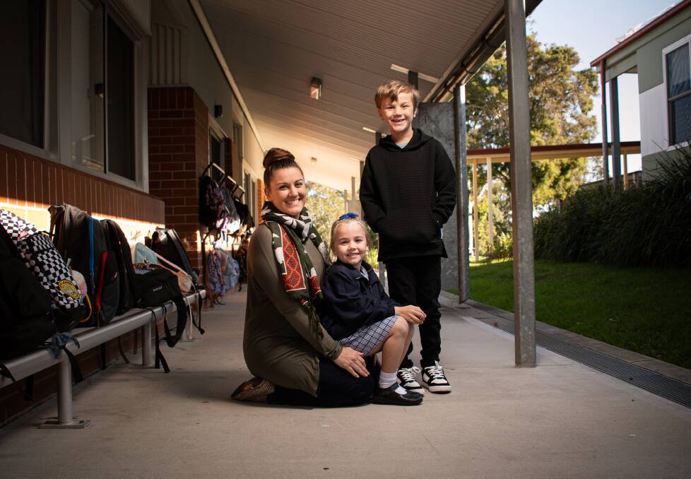 Close: Lisa Wilson, with Everly and George, who will attend school on Mondays and Thursdays respectively. Picture: Simon McCarthy